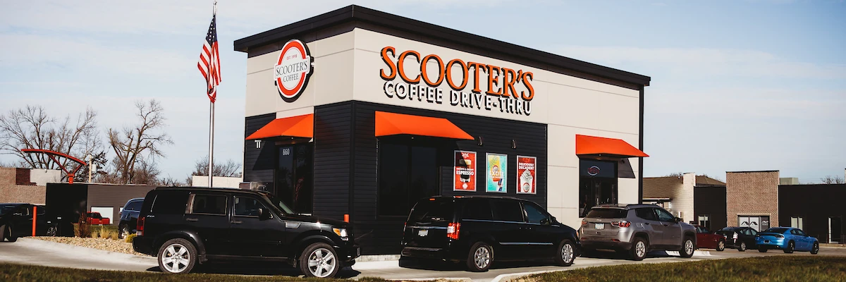 The Scooter's Coffee franchise opportunity lets you open a drive-thru coffee kiosk with built-in demand.