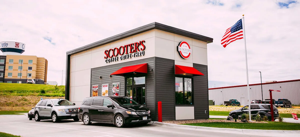 Scooter's Coffee franchise models include a drive-thru coffee kiosk with a smaller footprint and drive-thru.