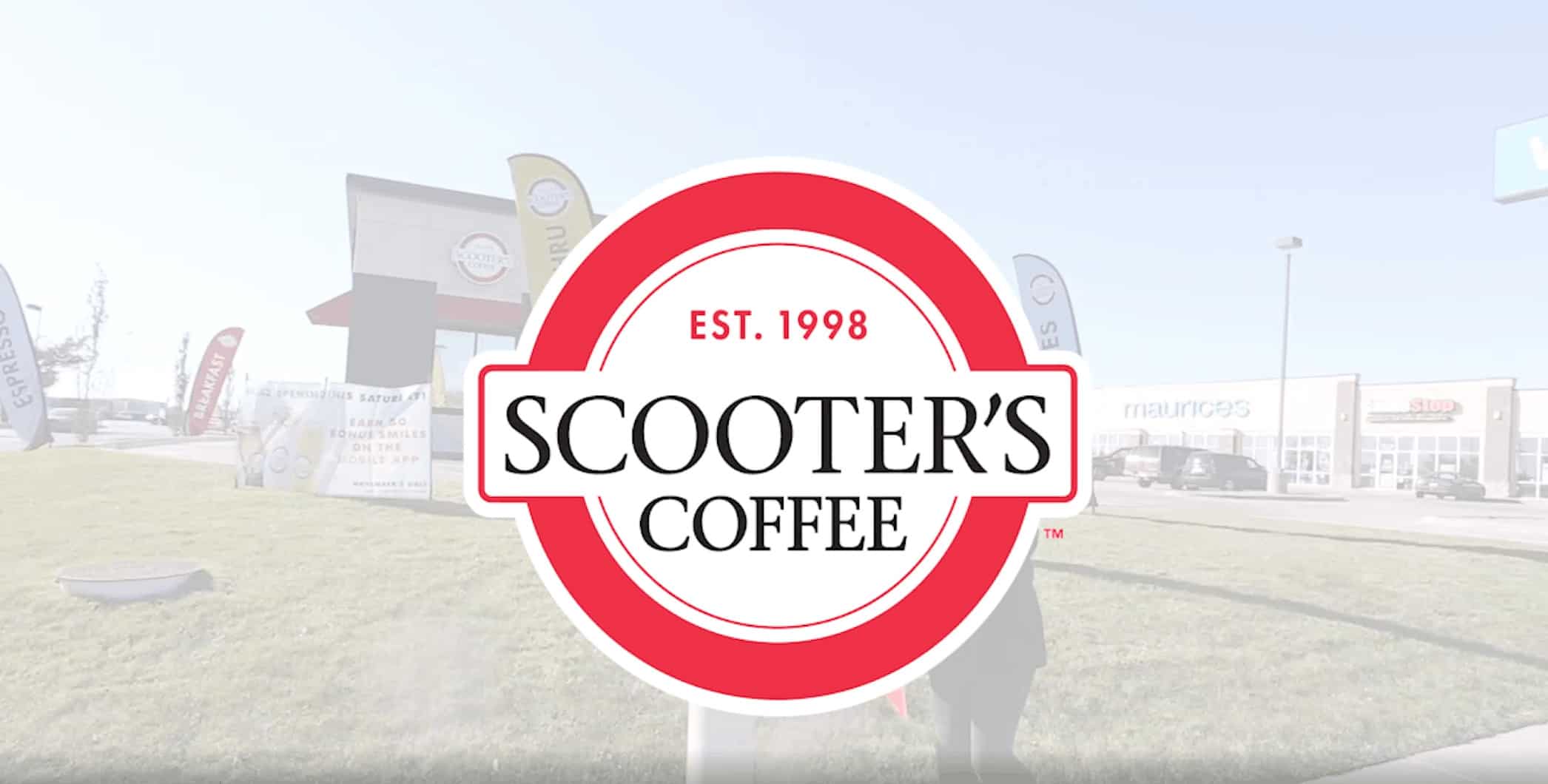 An image of a Scooters Kiosk with a white transparent cover over it, and then the Scooter's Coffee Logo Prominent in the center.