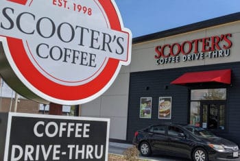 Scooter's Coffee franchise building with cars